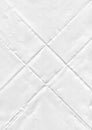 white paper flip textured white sheet of paper with realistic curled under warm incandescent Royalty Free Stock Photo