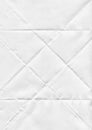 white paper flip textured white sheet of paper with realistic curled under warm incandescent Royalty Free Stock Photo