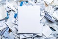 White Paper Frame Surrounded by a Heap of Discarded Papers Royalty Free Stock Photo