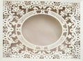 White paper hollow lace oval frame, done in the ornate and luxurious style on a pink background, place for text, room for copy