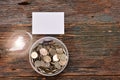 White paper mock up,light bulb for idea and stack coins in glass Royalty Free Stock Photo