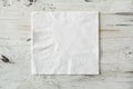 White paper napkin on wooden background Royalty Free Stock Photo