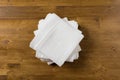 White paper napkin on wooden background Royalty Free Stock Photo