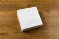 White paper napkin on wooden background Royalty Free Stock Photo