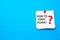 White paper note with red pin asking how to start again on blue background image Royalty Free Stock Photo