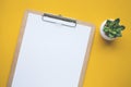 White paper notepad on pastel color backgrounds.Flat lay design.