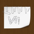 White paper for notes and a set of paper clips Royalty Free Stock Photo