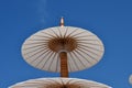 White paper parasol and blue sky Royalty Free Stock Photo