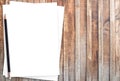 White paper and pencil on old wooden background. Royalty Free Stock Photo