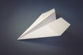 White paper plane origami isolated on a grey background Royalty Free Stock Photo