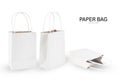 White paper shopping bag isolated on white . Royalty Free Stock Photo