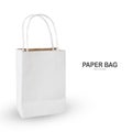 White paper shopping bag isolated on white . Royalty Free Stock Photo
