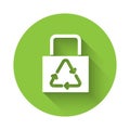 White Paper shopping bag with recycle icon isolated with long shadow. Bag with recycling symbol. Green circle button Royalty Free Stock Photo