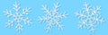 White paper snowflakes on a blue background. Happy New Year and Merry Christmas. Holiday elements. Set of snowflakes. Vector illus Royalty Free Stock Photo