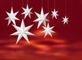 White paper stars on red Royalty Free Stock Photo