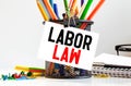 white paper on the white background with text Labor Law Royalty Free Stock Photo