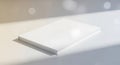 White Paperback Book on White Surface with Natural Light Royalty Free Stock Photo