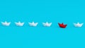 White paperboats in one direction with one red paperboat changing direction on cyan background. Being innovative and