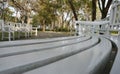 White park benches in blurred Royalty Free Stock Photo