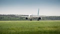 White passenger aircraft preparing for take-off Royalty Free Stock Photo