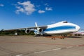 Modern passenger airplane parked to terminal