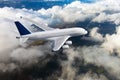 White passenger double decker plane in flight. Above view.