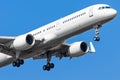 White passenger plane, cockpit, nose, engines in the sky close up. Royalty Free Stock Photo