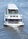 White passenger ship sails on a river Royalty Free Stock Photo