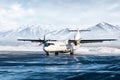 White passenger turboprop aircraft on the winter airport apron on the background of high scenic mountains