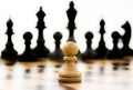 White Pawn Against A Superiority Of Black Chess Pieces