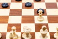 white pawn and black checkers piece moves closeup Royalty Free Stock Photo