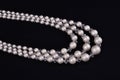 White pearls luxury necklace on black background Royalty Free Stock Photo