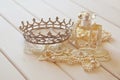 White pearls necklace, diamond tiara and perfume bottle Royalty Free Stock Photo