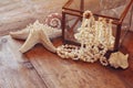 White pearls necklace on grunge wooden table Royalty Free Stock Photo