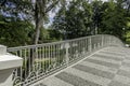 White pedestrian bridge over Ratnycia river near Nemunas in Druskininkai, Lithuania Royalty Free Stock Photo