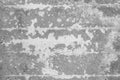 White peeling paint from old concrete surface worn weathered cement wall texture background Royalty Free Stock Photo