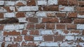 White shabby curved brick wall