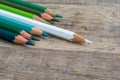 White pencil and many green pencil