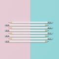White Pencils Sorting on Pink and blue pastel paper background