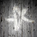 White pentacle on wood