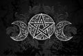 White pentagram with leaves on black background