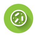 White Petri dish with bacteria icon isolated with long shadow. Green circle button. Vector