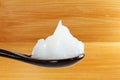 White petroleum jelly in spoon