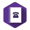 White Phone book icon isolated with long shadow. Address book. Telephone directory. Purple hexagon button Royalty Free Stock Photo