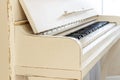 White piano, side view of instrument, musical instrument. learn