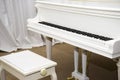 White Piano on the stage of concert hall Royalty Free Stock Photo