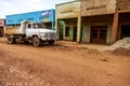 A white pickup on dirt road. Royalty Free Stock Photo