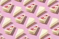 White piece slice cheesecake pattern on pink background