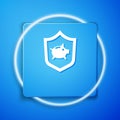 White Piggy bank with shield icon isolated on blue background. Saving or accumulation of money, investment. Insurance Royalty Free Stock Photo