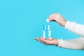 White pill and a glass of water in man hands. Health concept. Close up of man holding a pill. Glass of water tablet Royalty Free Stock Photo